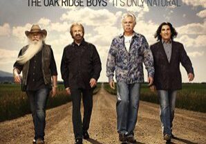 The Oak Ridge Boys walking confidently in a rural field.